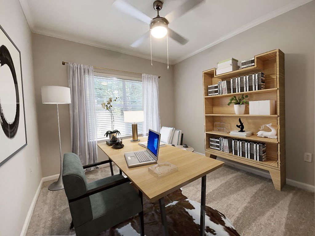 A room with a desk, chair, and a bookshelf.