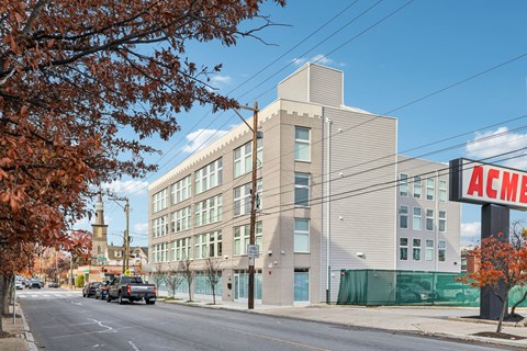A modern building with the letters ACME on the side.