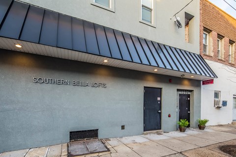 The image shows the front of a building with a sign that reads "SOUTHERN BELLA LOFI".