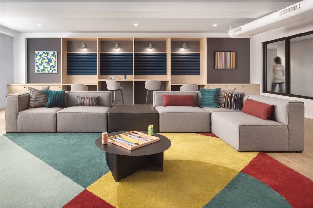 a rendering of a living room with couches and a coffee table