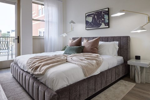 Spacious bedroom with modern furnishings and natural light at Garden Court Towers Apartments, Pennsylvania