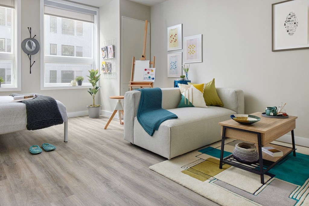 a living room with a couch and a table