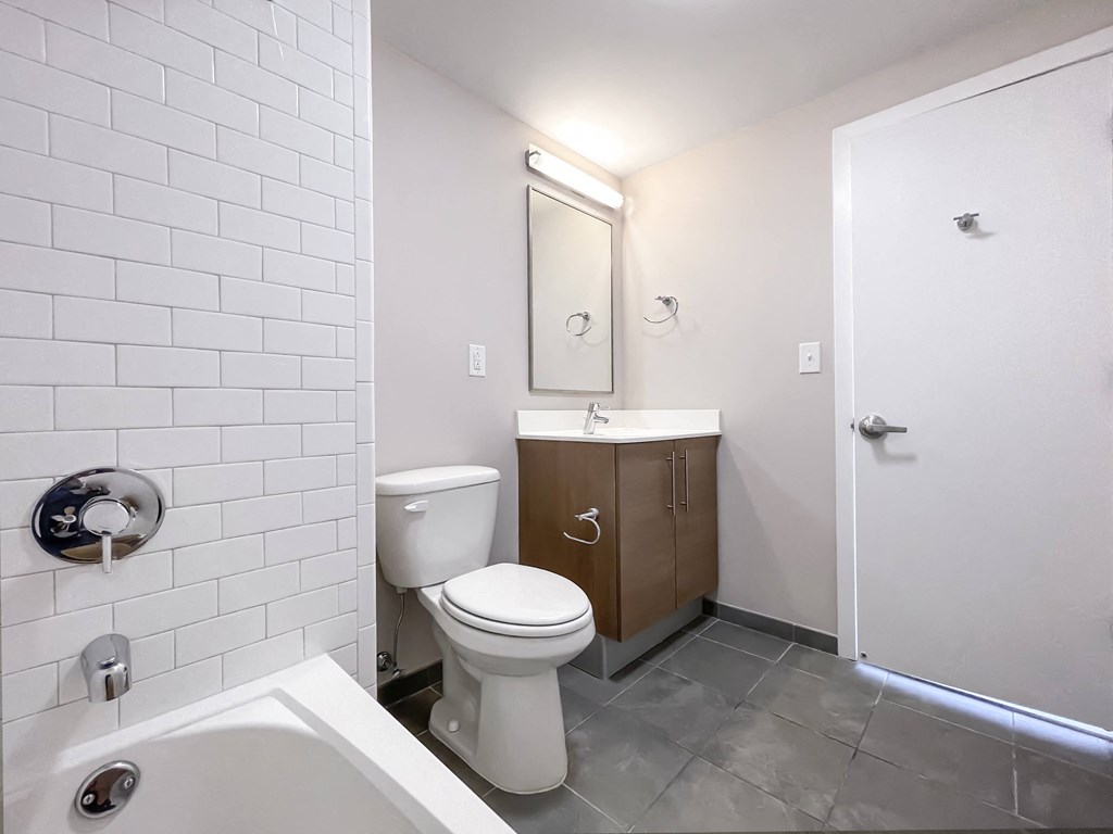 a bathroom with a toilet and a sink