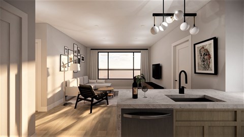 A modern kitchen with a dining table and chairs.