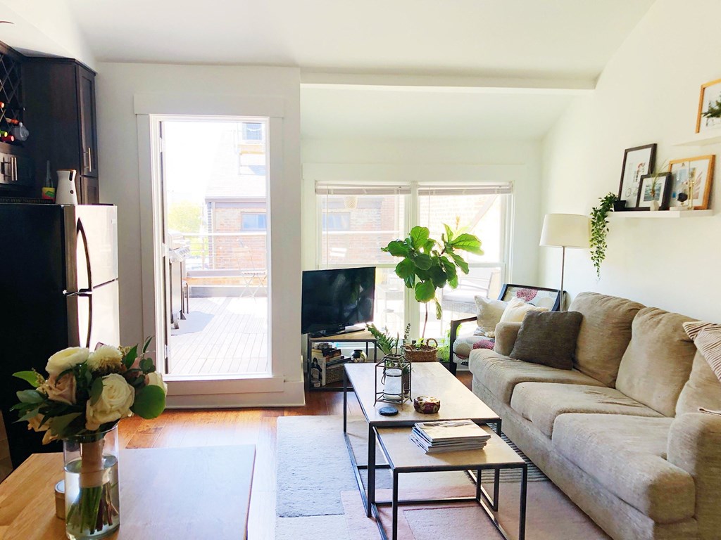 a living room with a couch and a table