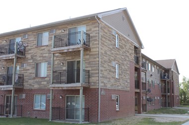our apartments have a large yard for playing frisbee
