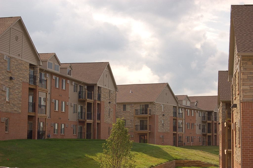 an apartment complex on a cloudy day