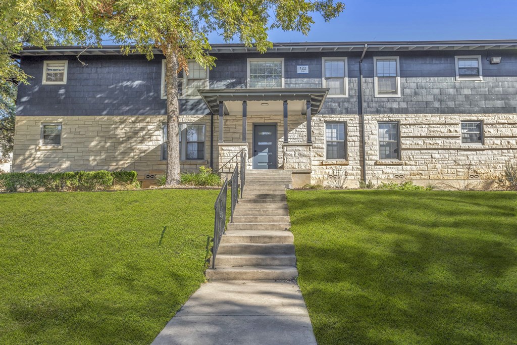 the front of a house with a sidewalk in front of it  at Sunset Ridge, Texas, 78209