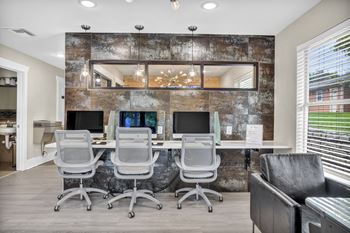 an office with a long desk with computers and chairs at Sunset Ridge, San Antonio, Texas
