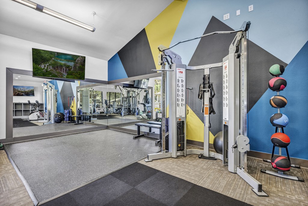 the gym at the flats at big tex apartments  at Sunset Ridge, San Antonio, TX