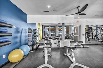 the gym at the enclave at woodbridge apartments in sugar land, tx  at Urban Crest Apartments, San Antonio, TX, 78209