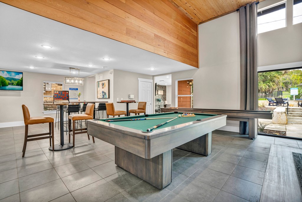 play a game of pool in our clubhouse at our apartments