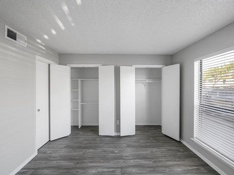 the preserve at ballantyne commons apartment living room with large windows and white walls