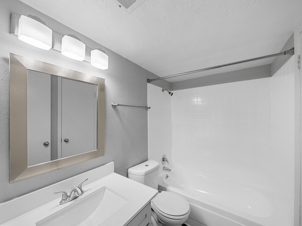 Bathroom with sink, toilet and bathtub at The Stella, Irving, TX, 75038