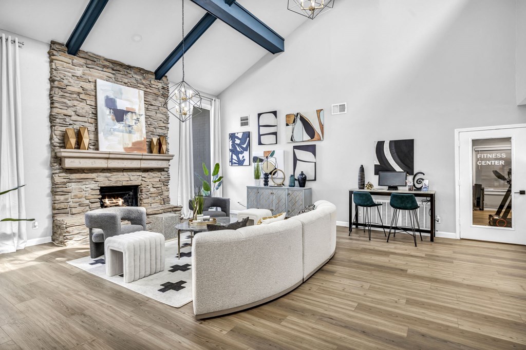 a living room with a couch and a fireplace