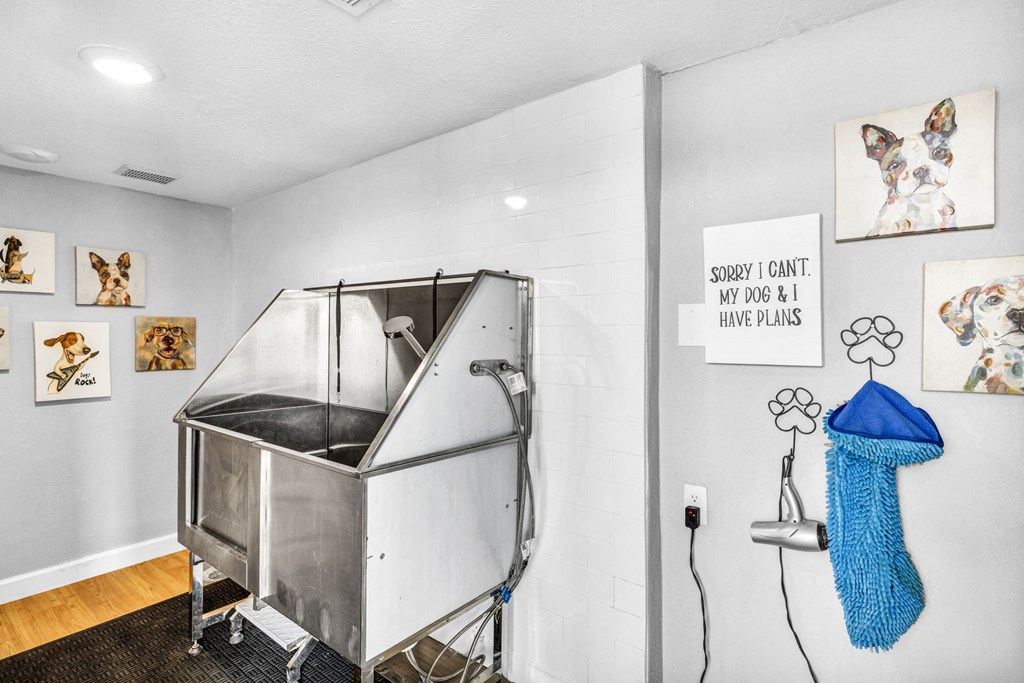 a bathroom with a tub and a shower in it