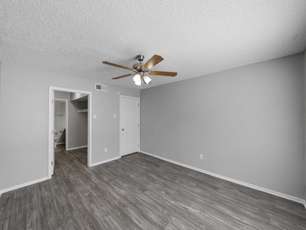 Bedroom with bath and walk-in closet at The Stella, Irving, TX, 75038