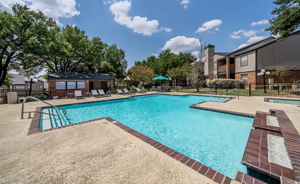 Resort style pool at Trinity Apartments, Irving, TX, 75061