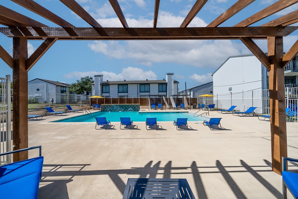 Umbrella Shaded Chairs By Pool at The Stella, Irving, Texas