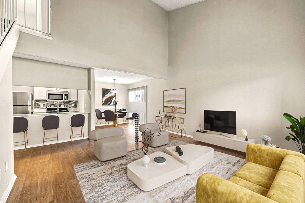 a living room with a yellow couch and a white coffee table at The Hudson, Carrollton, TX 75006 ?
