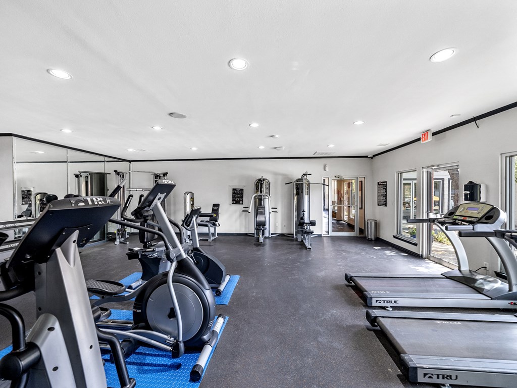 Fitness center with treadmills at Trinity Apartments, Irving, Texas