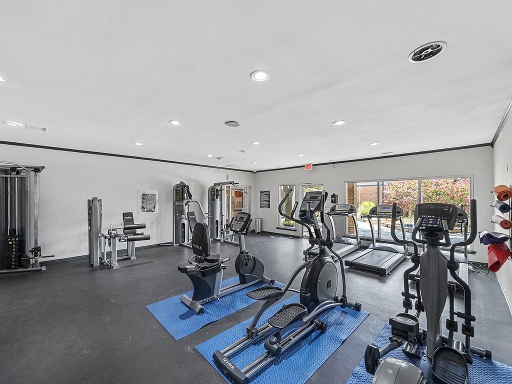 Fitness center at Trinity Apartments, Irving, 75061