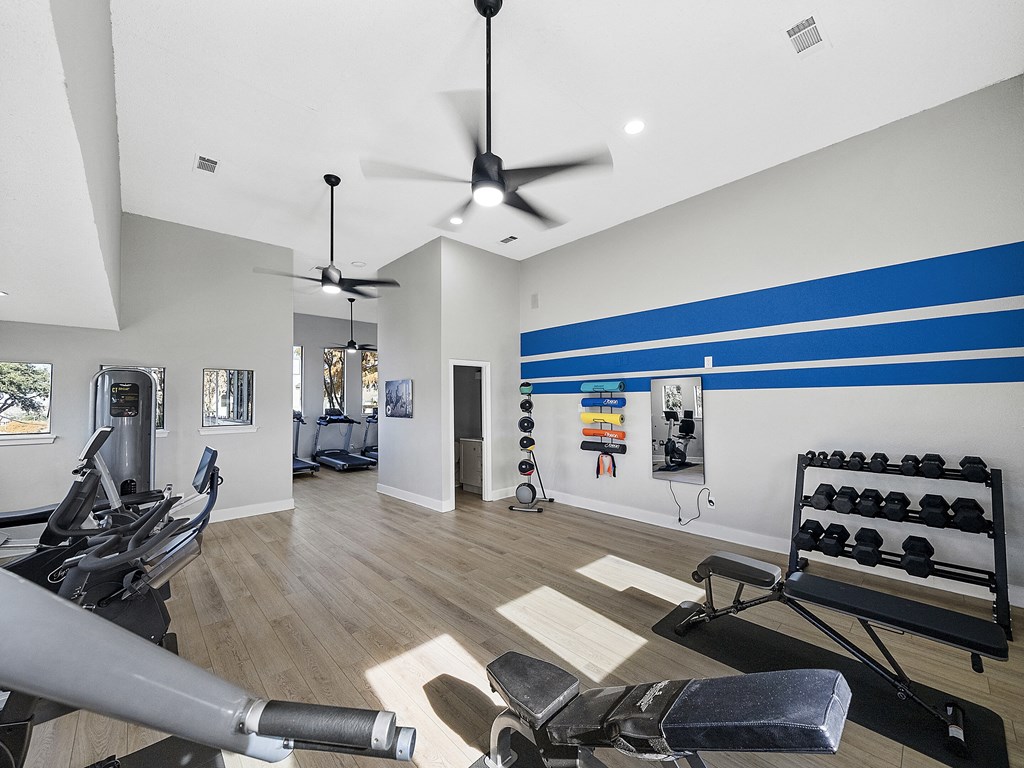 the gym at the flats at big tex apartments