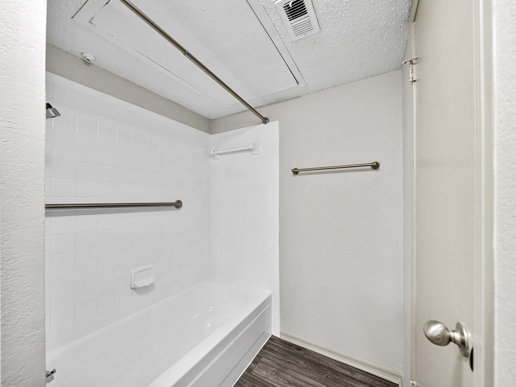 Bathroom with a bathtub at Trinity Apartments, Irving