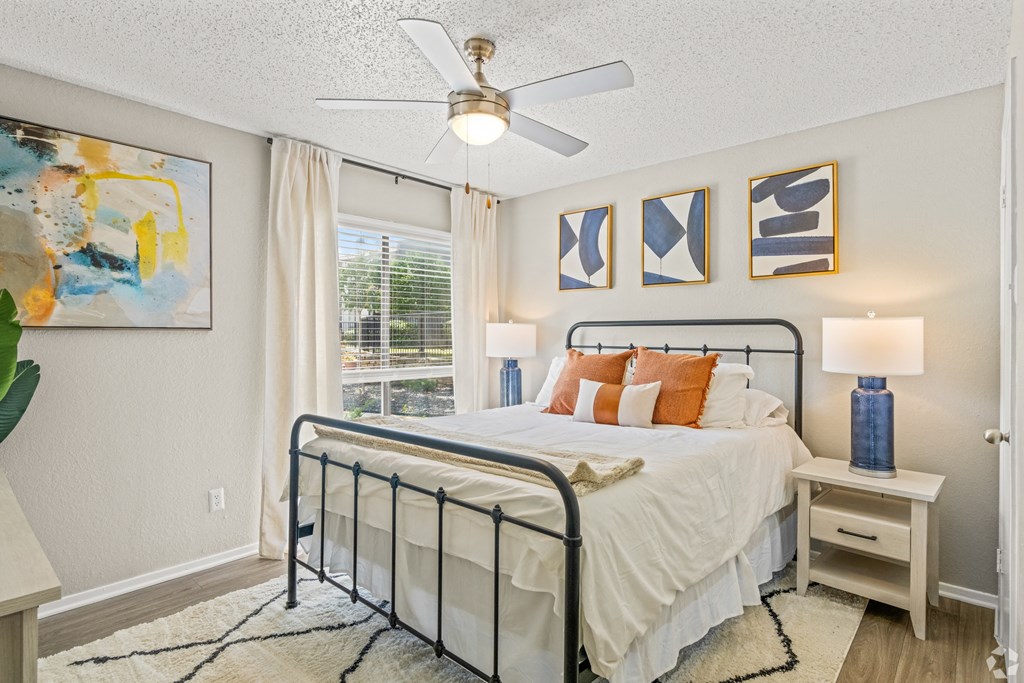 a bedroom with a bed and a ceiling fan at District 2308, Arlington, TX 76011 ?