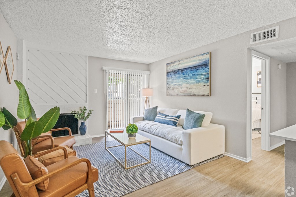 a living room with a couch and a table at District 2308, Texas ?