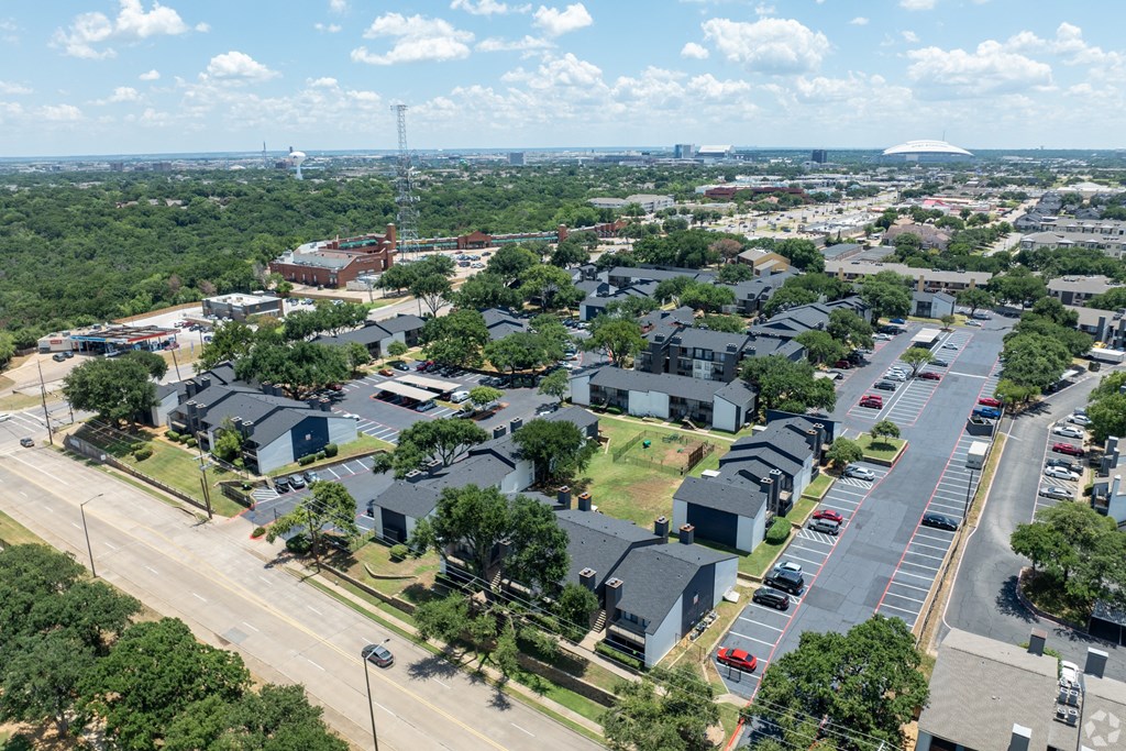 an aerial view of a neighborhood of houses in a city at District 2308, Arlington, TX 76011 ?