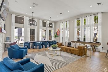 a living room with couches and chairs and a table at District 2308, Arlington, TX 76011 ?