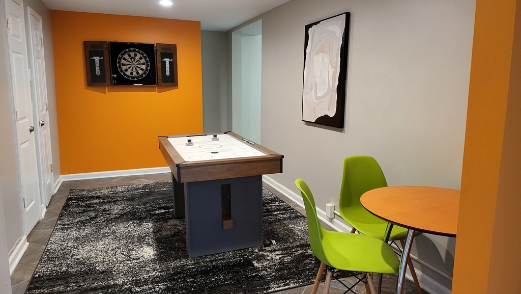 Game room with a dart board at Willow Apartments, Nashville