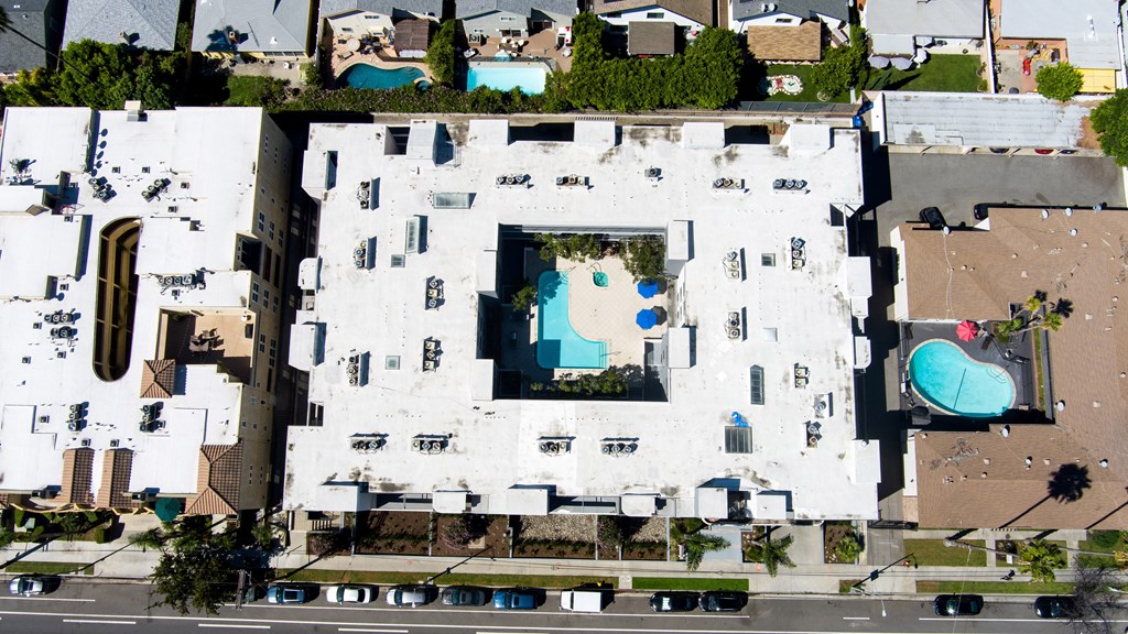 a roof with a swimming pool on top of a building
