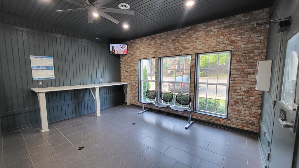 Laundry room with waiting area at Willow Apartments, Nashville, TN, 37217