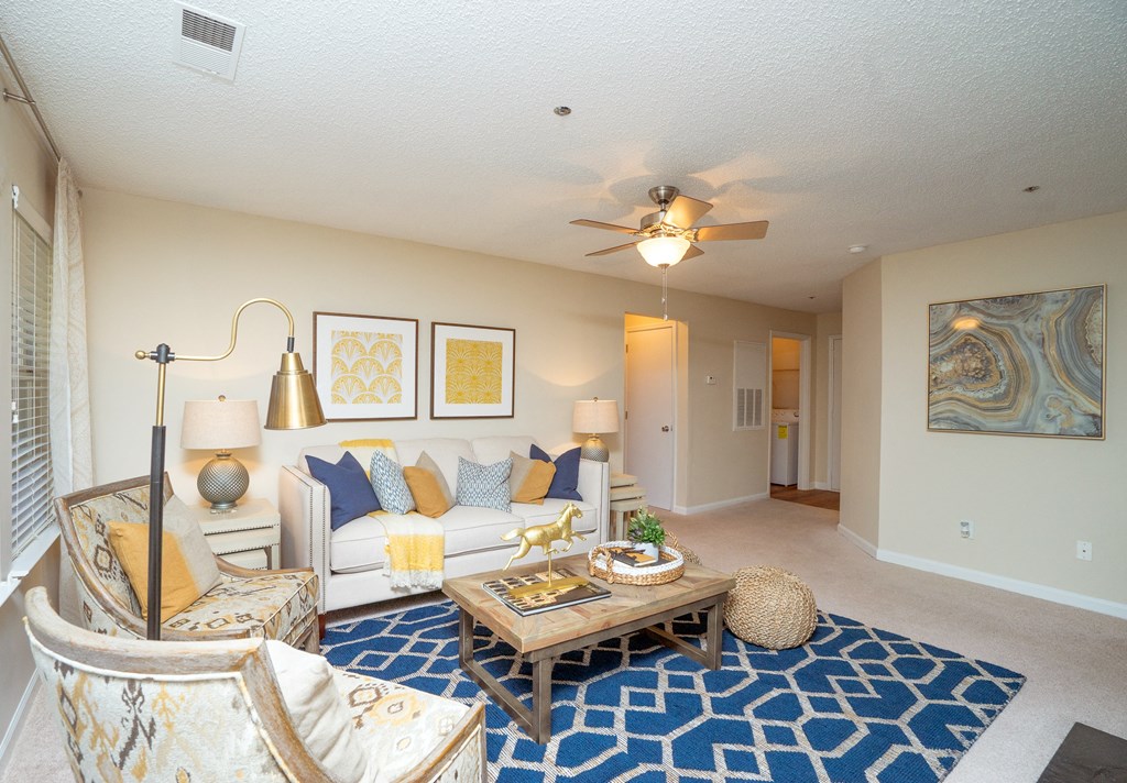 a living room with a couch and a coffee table