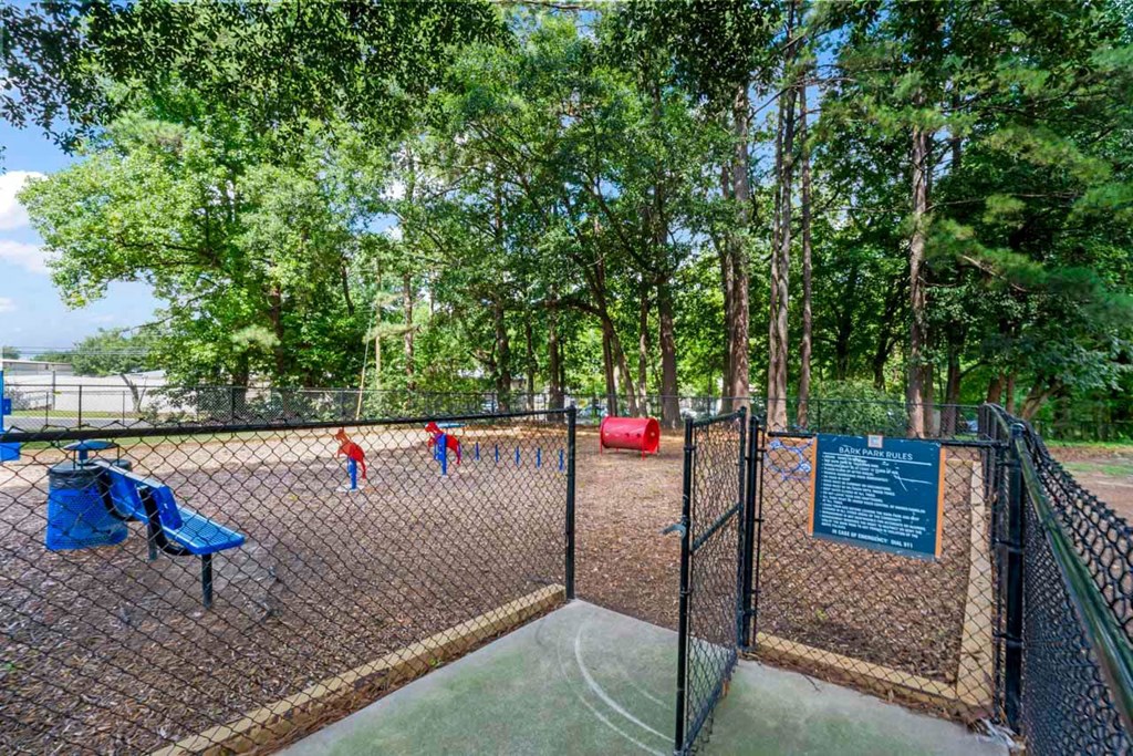 our apartments showcase a dog park with a playground