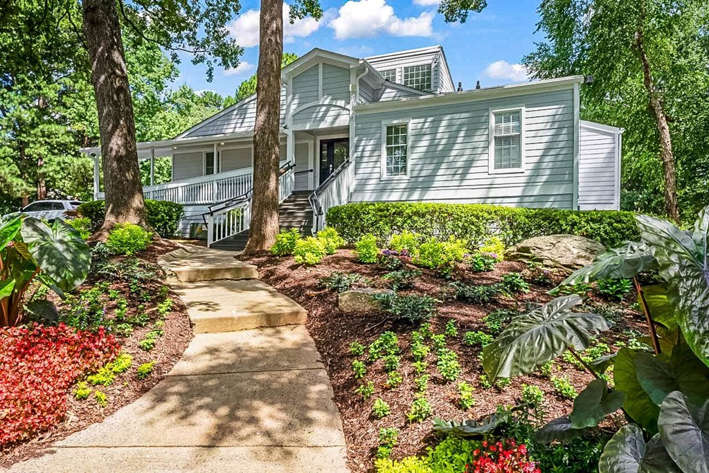 a house with a garden in front of it