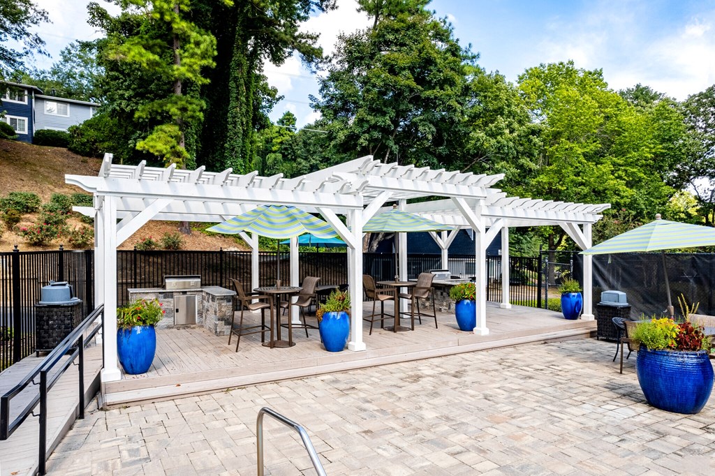 Gazebo and grilling area by pool at Collier Ridge Apartments in Atlanta GA