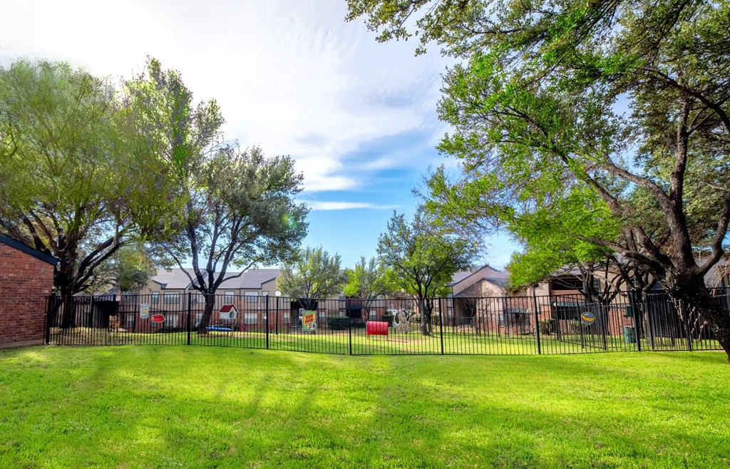 Dog park at Trinity Apartments, Texas, 75061