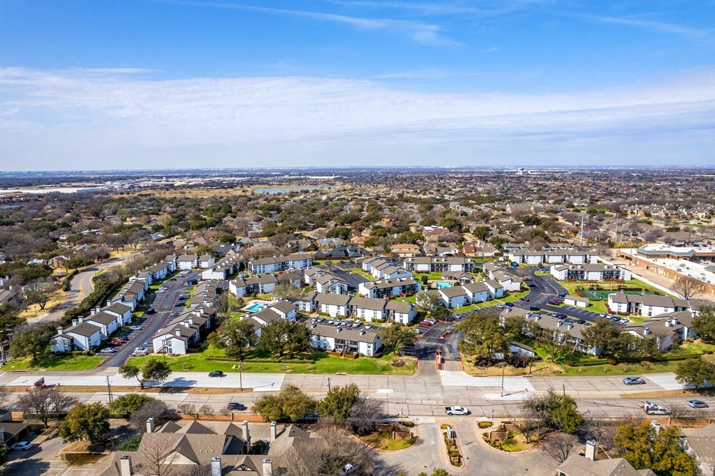 an aerial view of a neighborhood of houses in a city at Keller Oaks, Carrollton, TX ?