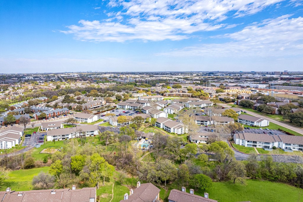 an aerial view of a neighborhood with houses and lawns at The Hudson, Carrollton, 75006 