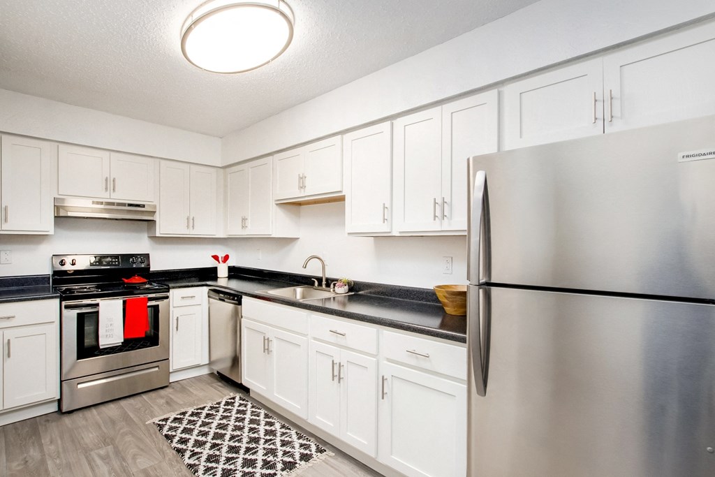 the preserve at ballantyne commons apartment kitchen with stainless steel appliances