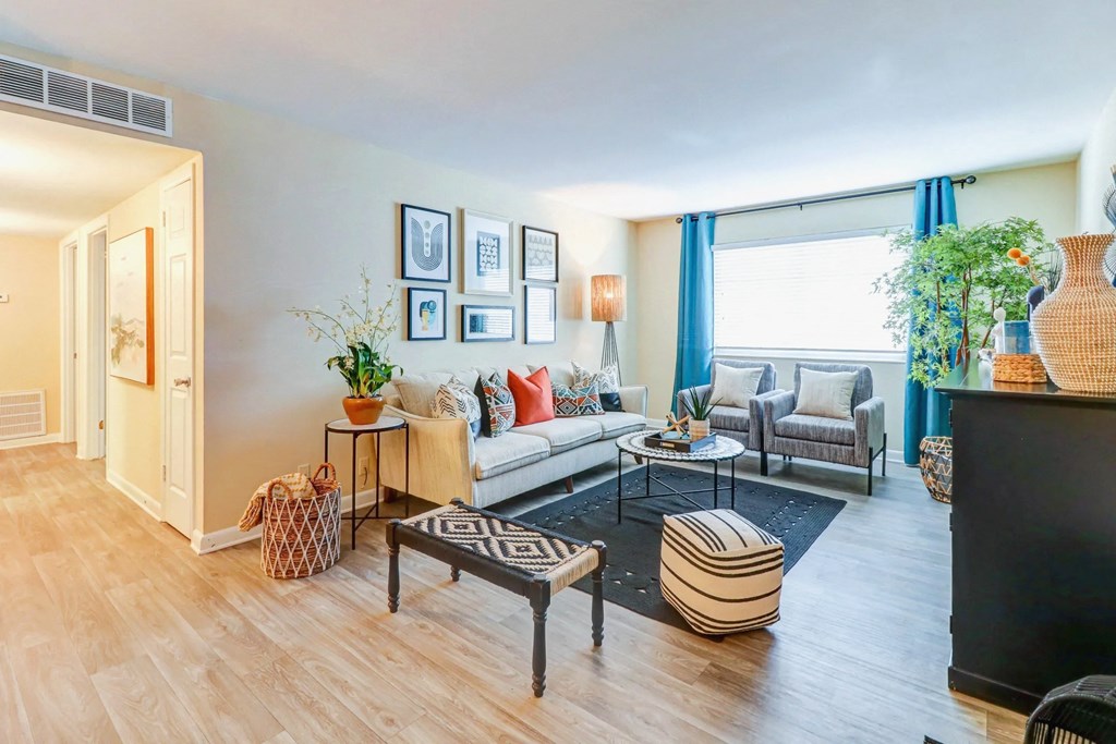 a living room with a couch and a tv