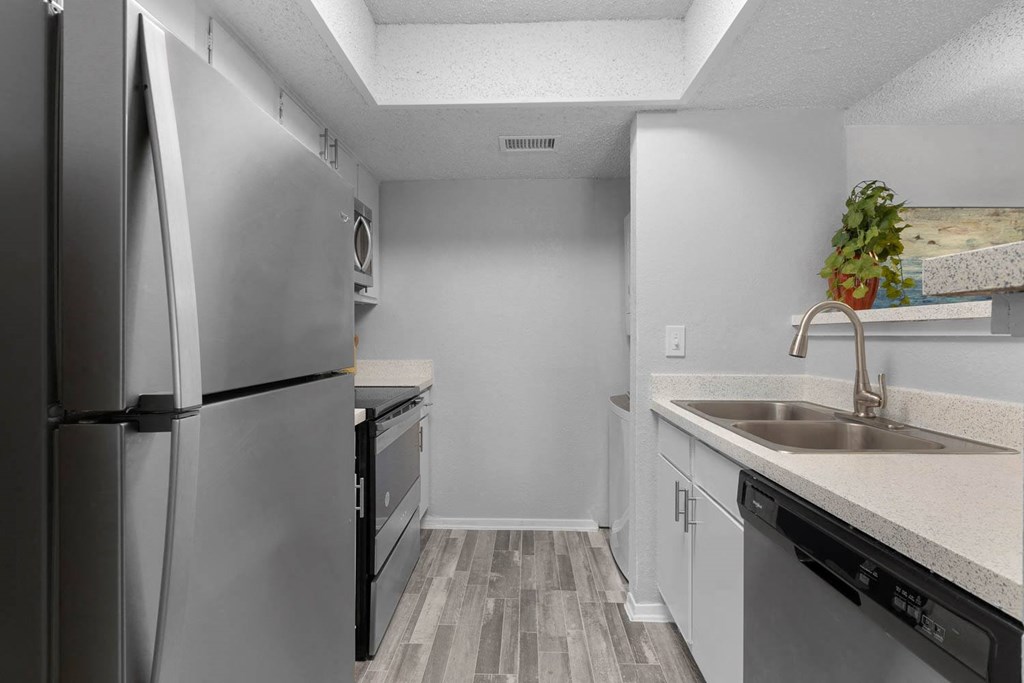 a kitchen with stainless steel appliances and a sink at District 2308, Arlington ?