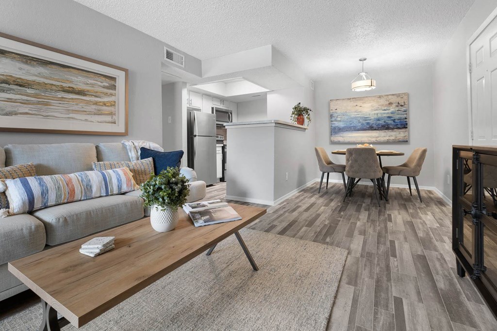 a living room with a couch and a table at District 2308, Arlington, TX 76011 