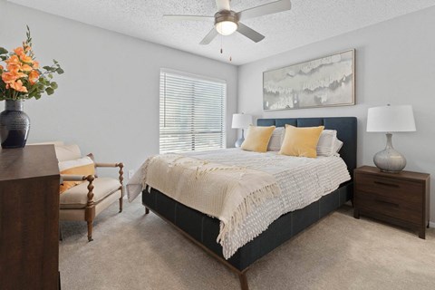 a bedroom with a bed and a ceiling fan at District 2308, Arlington ?
