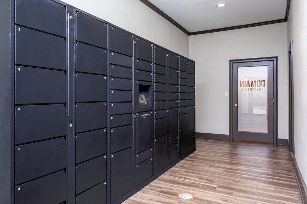 a row of lockers in a room with a door