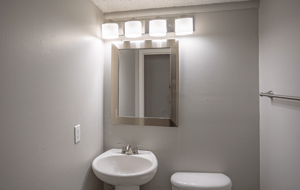 Bathroom with a sink and mirror at Willow Apartments, Nashville, 37217