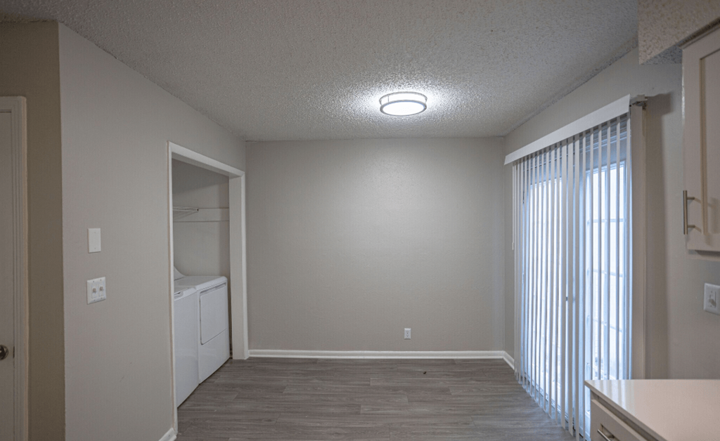 Laundry room with machines  at Willow Apartments, Nashville, TN, 37217